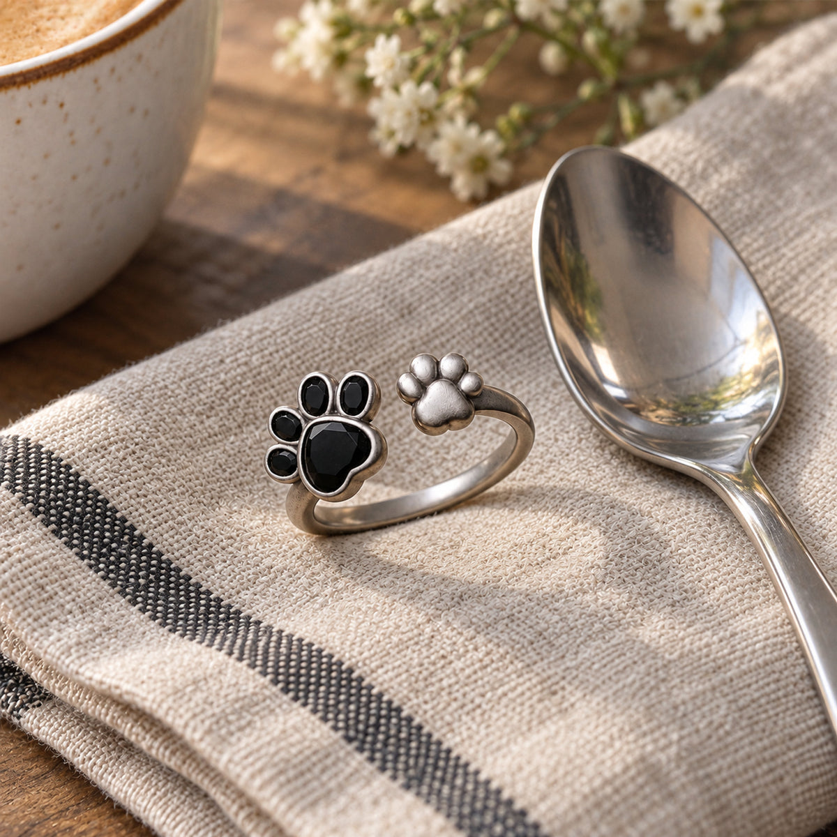 Adjustable Paw Print Ring, close-up
